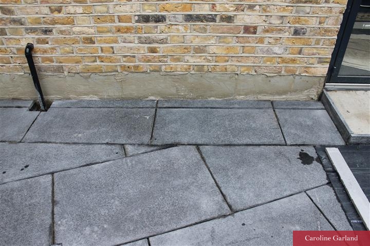 Burntwood Lane, Wandsworth - some superb jiggery pokery with the basalt paving