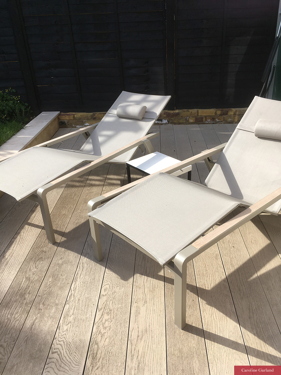 Sun loungers on composite decking